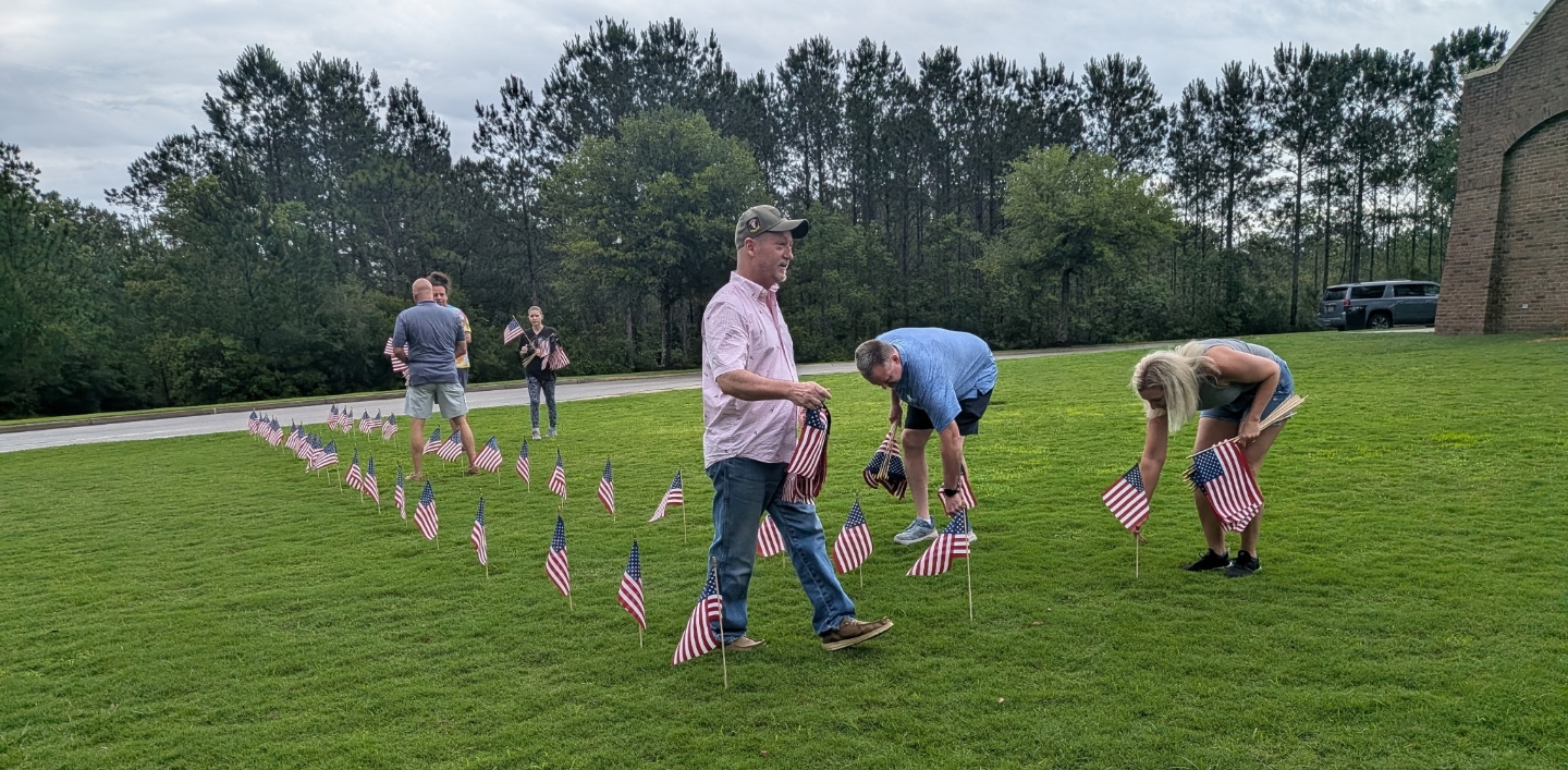Placing Flags at the State Veterans Cemetary in Spanish Fort, AL