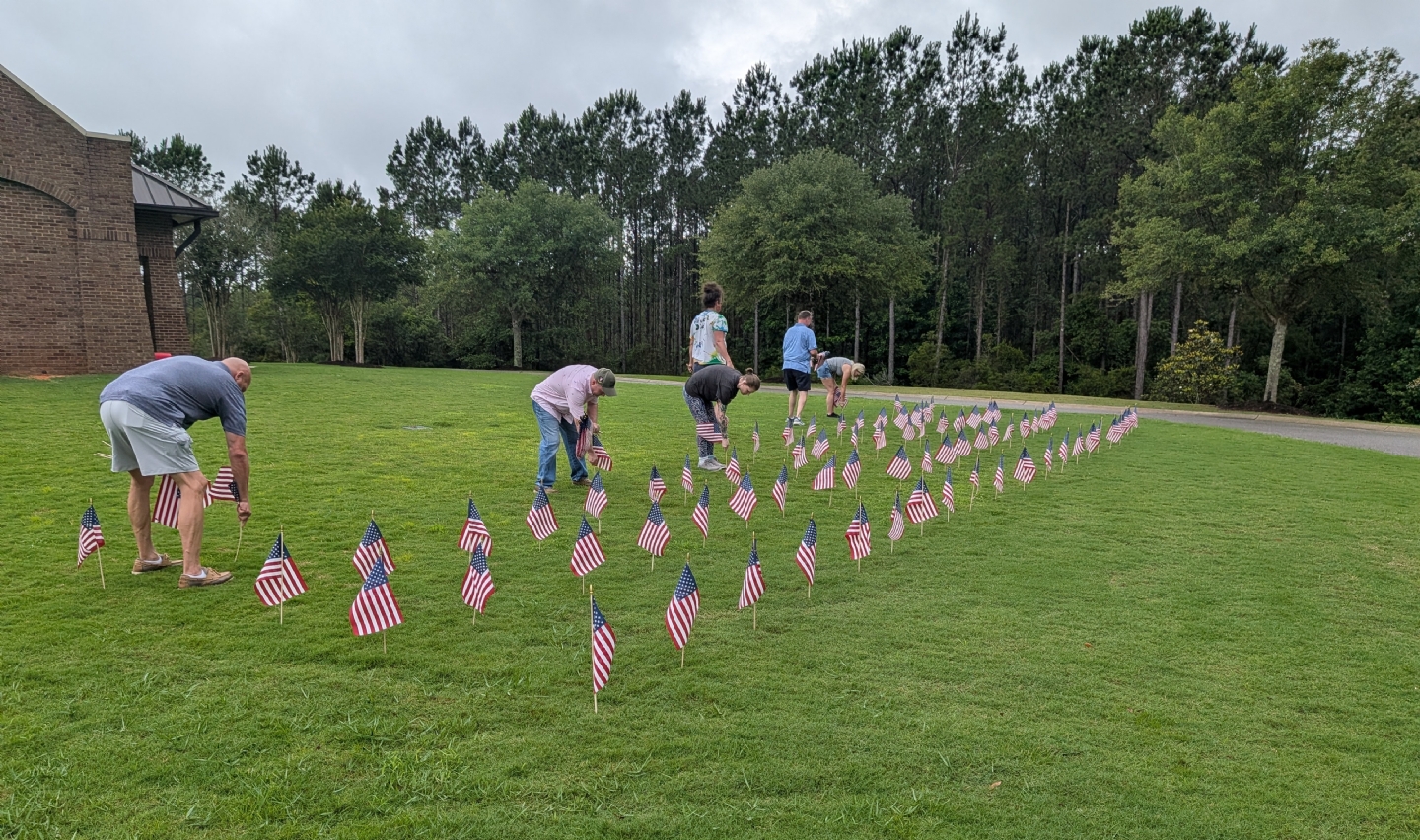 Placing Flags at the State Veterans Cemetary in Spanish Fort, AL
